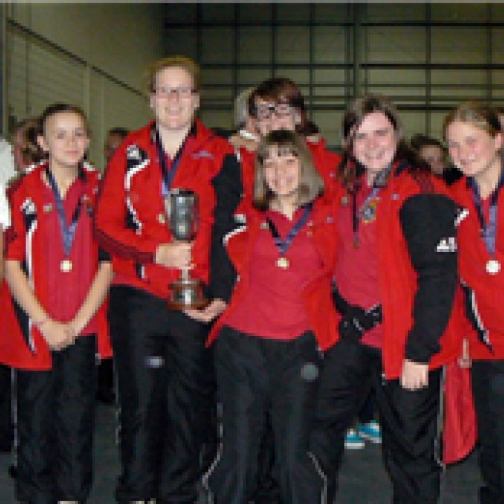 GIRLS BRING HOME GOLD