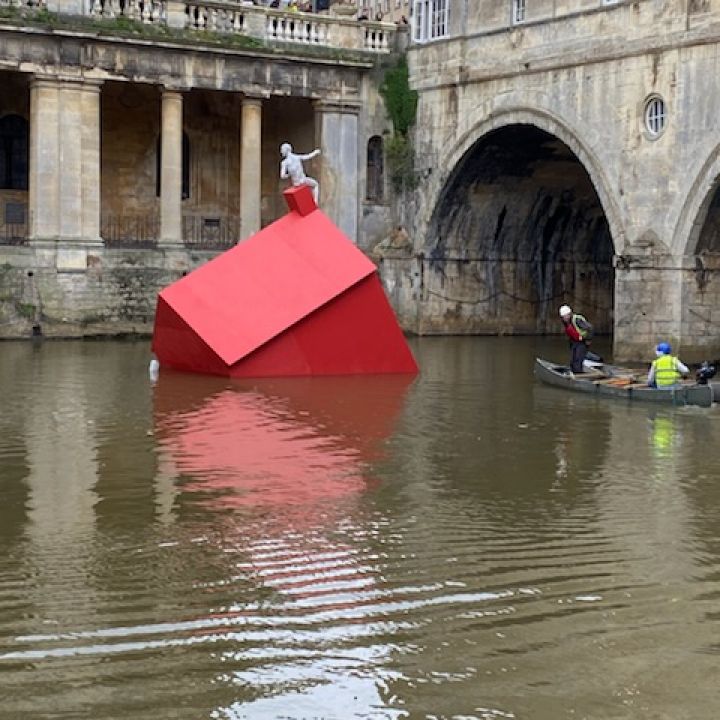 The Red Sinking house artwork afloat by Pulteney Bridge