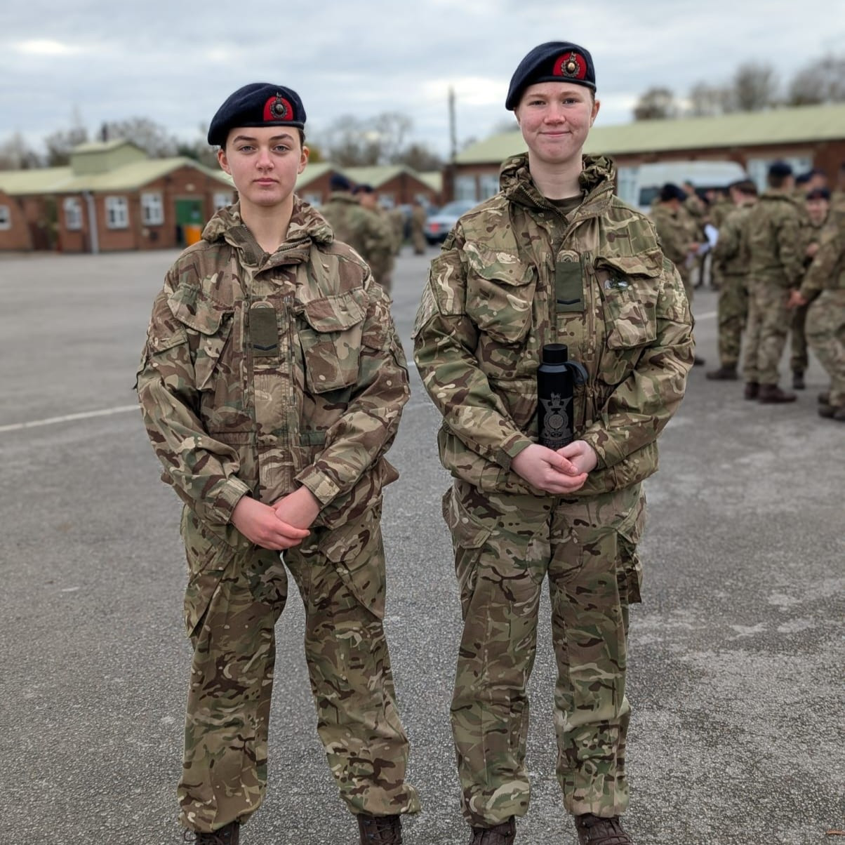 Lance Corporals Champion and Kujawska in uniform on their Corporal's Board.