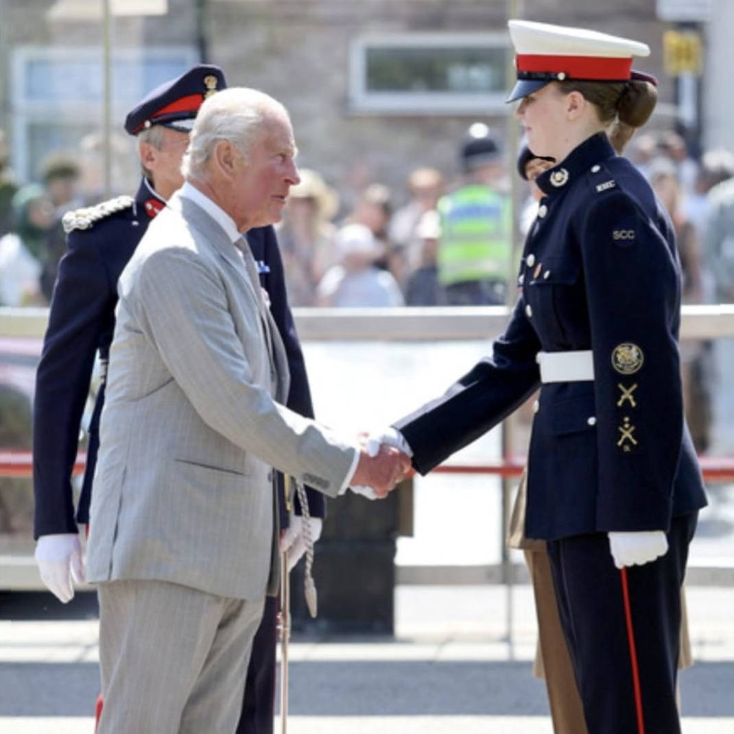 Cadet Corporal Champion shaking hands with HM The King on his visit to Cambridge.