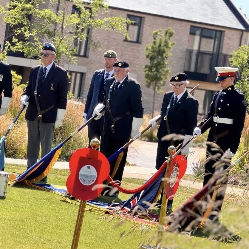 Royal Marine Cadet Day lowering the Sea Cadet Standard during the service.